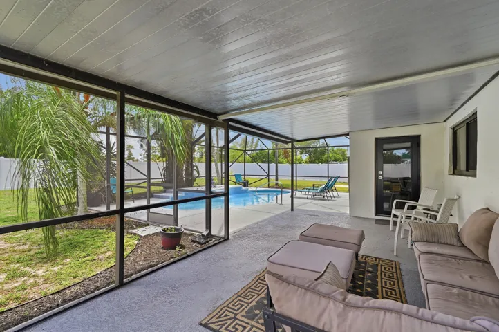 Seperate screened in patio area for outdoor relaxation