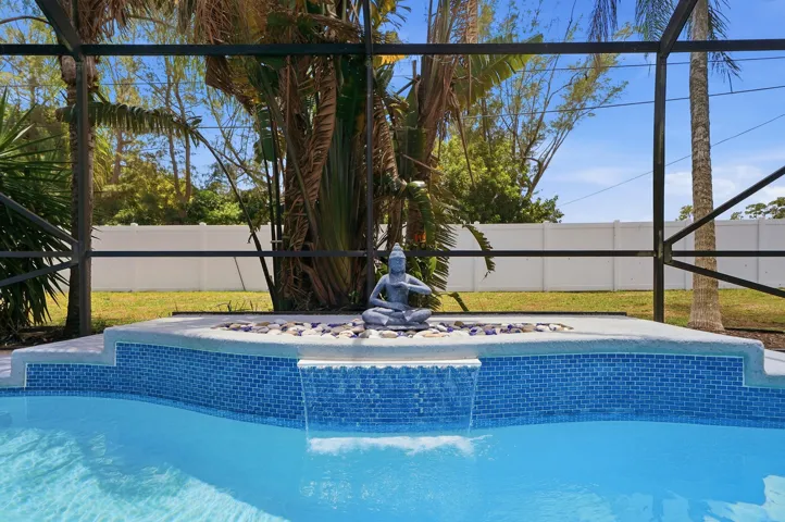 Pool waterfall adds calm and serenity