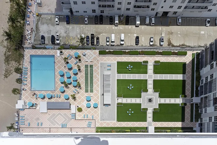 Aerial View from balcony overlooking pool and courtyard