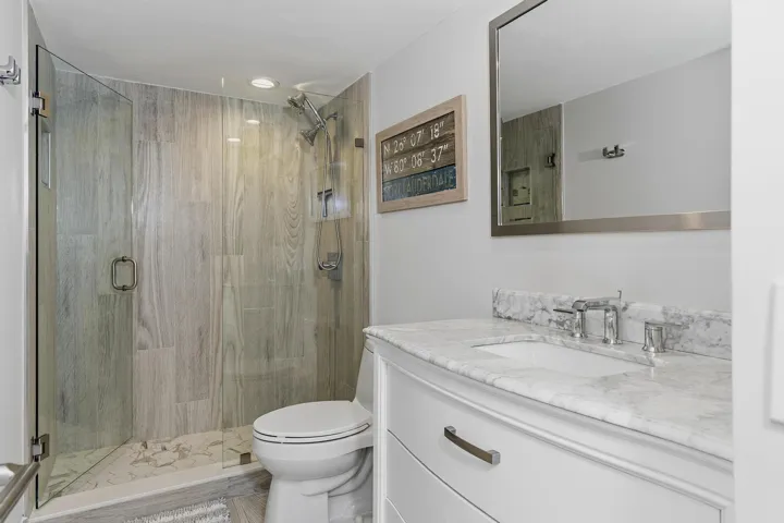Guest Bathroom with Renovated Tiled shower, new porcelain flooring