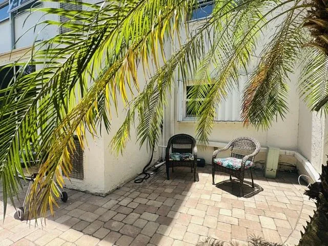 patio wraps around to masterbedroom