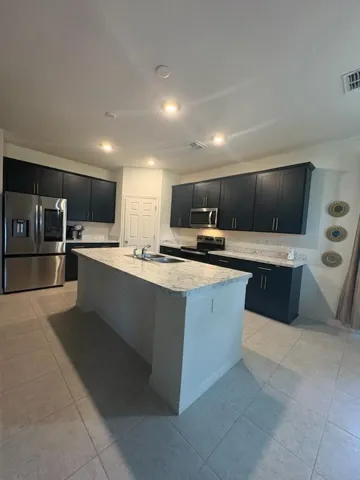 KITCHEN SHOWING APPLIANCES