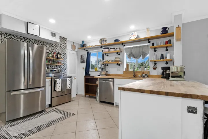 Open modern European with downtown views and newer appliances