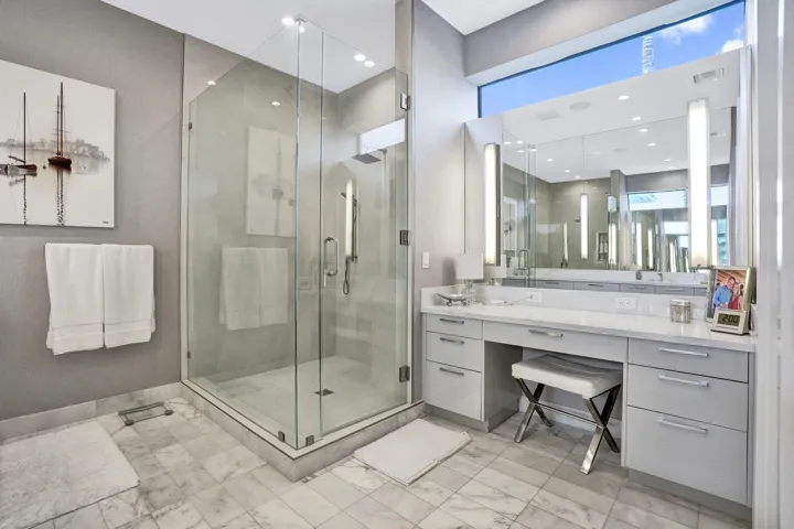 Shower is larger than picture shows. Awesome makeup vanity with great lighting.