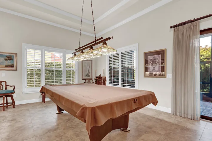 Plantation shutters are featured on every window in the home