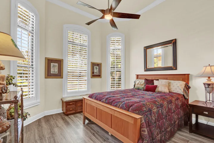 Bedroom 2 overlooks the front yard, LVP flooring