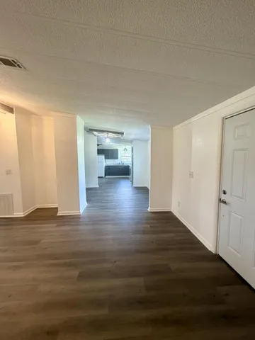 Living Room Looking Towards Dining and Kitchen