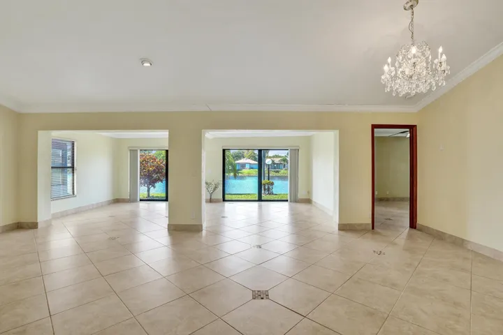 Living room, dining room and family room open and spacious with water views