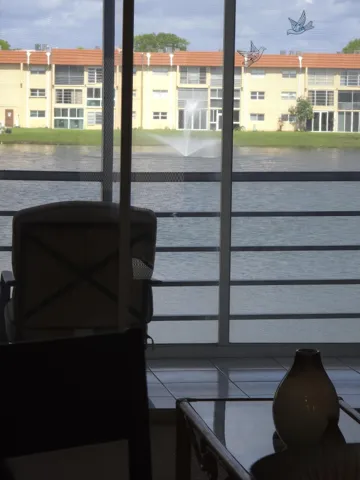 Relax on your screened patio with a lake view
