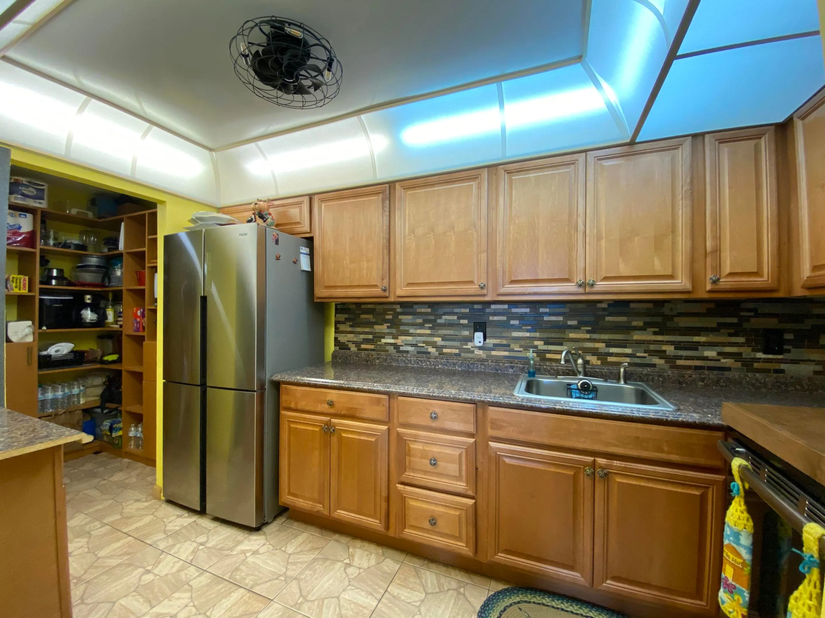 Updated Kitchen with Stainless Steel Refrigerator