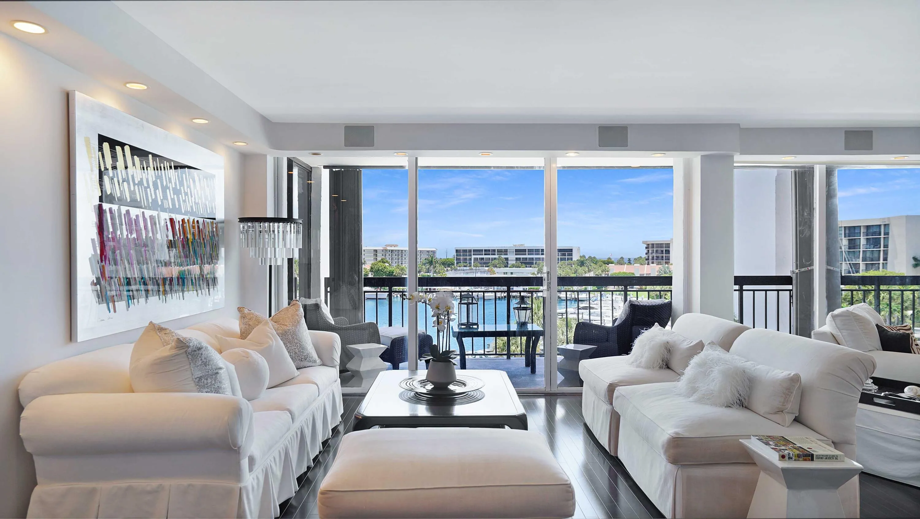 Living room with direct Intracoastal Waterway views in Boca Raton.