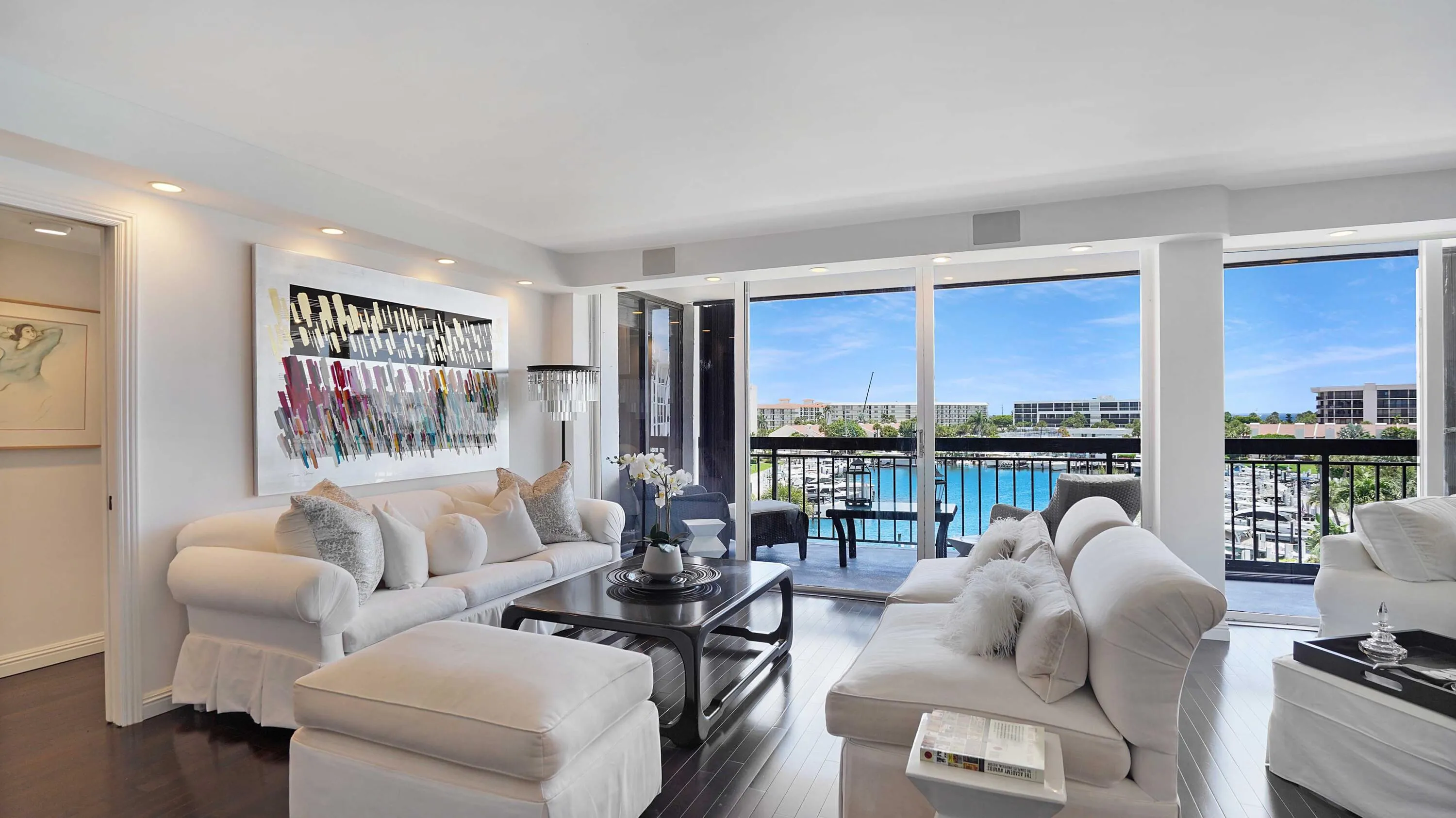 Open living space framed by panoramic water views.