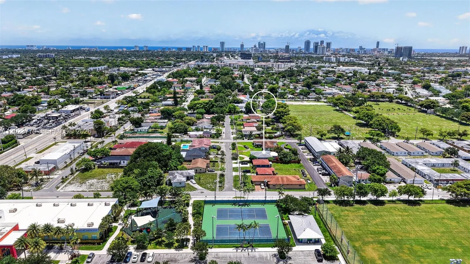 View to the city park with tons of amenities (Gym, Tennis, Playgrounds etc for just $11/month).