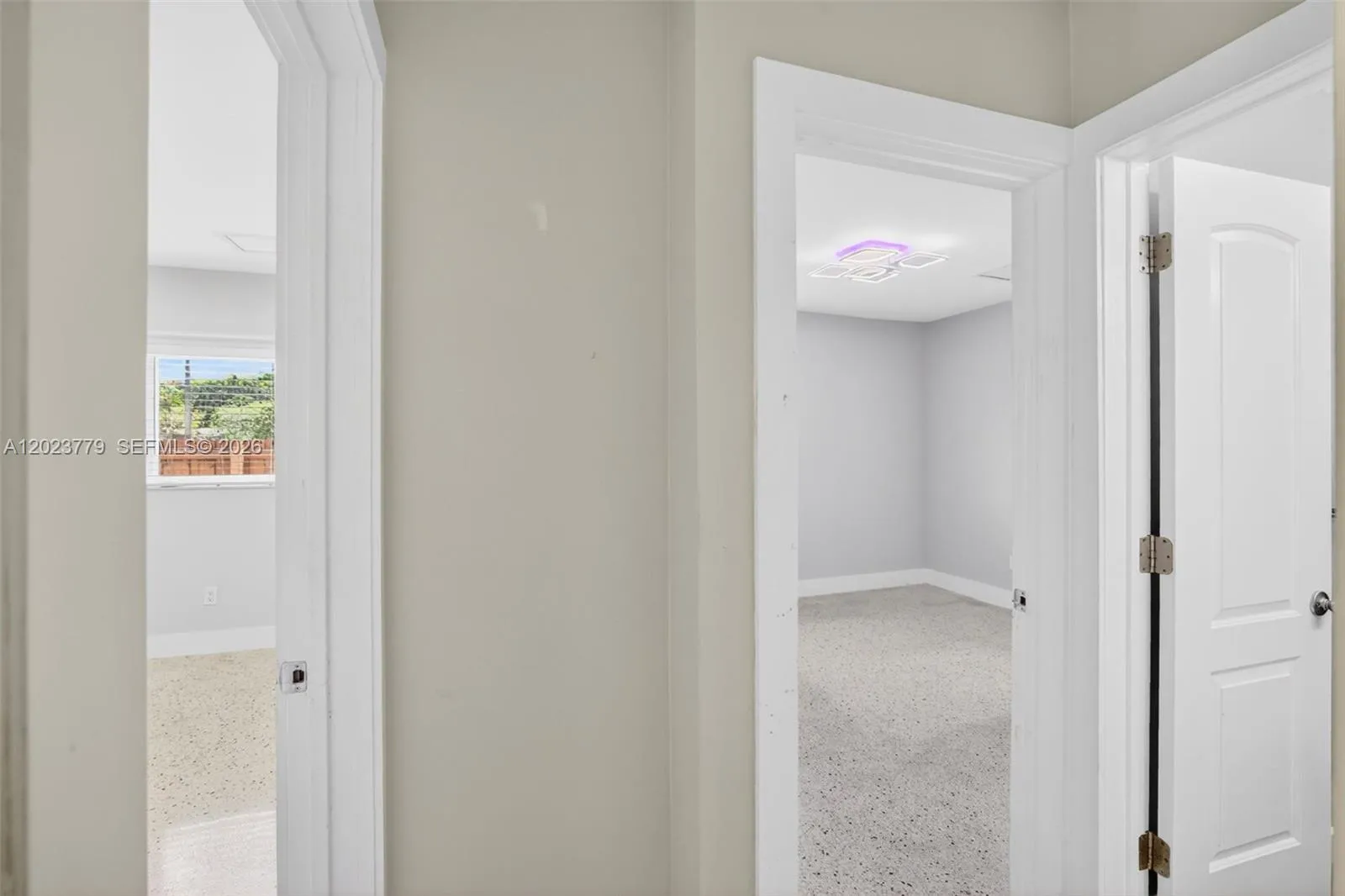 View toward two guest bedrooms and guest bathroom