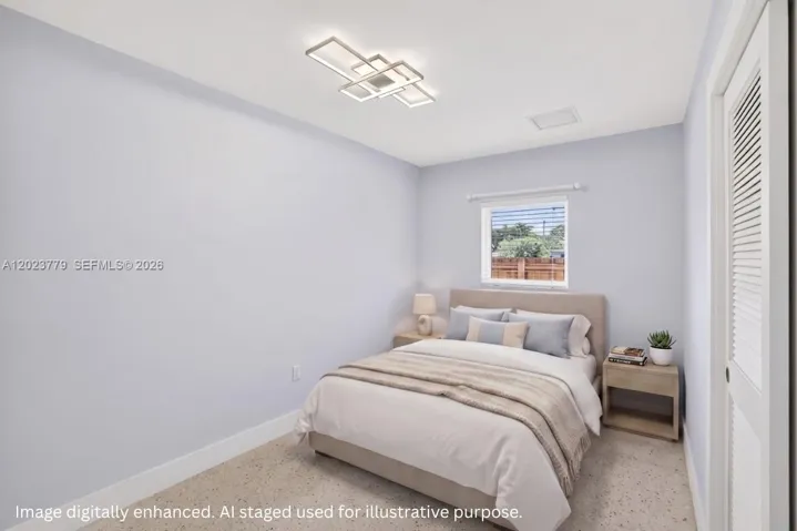 Guest bedroom overlooking side. Virtually staged