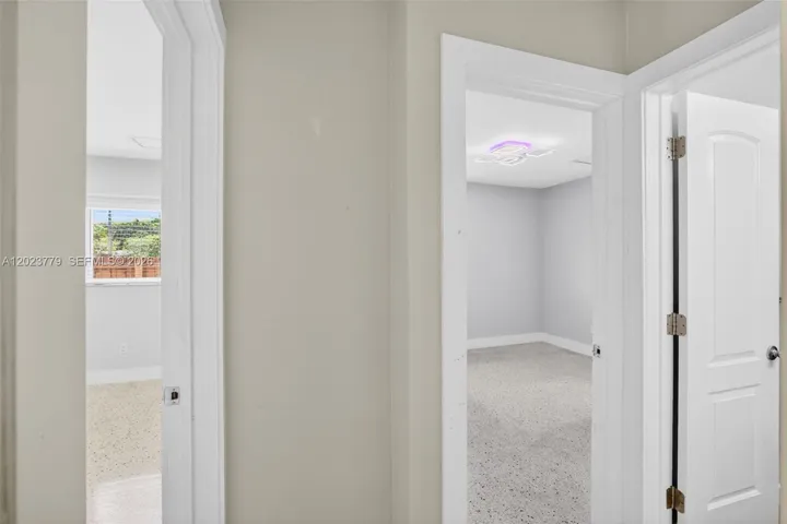 View toward two guest bedrooms and guest bathroom
