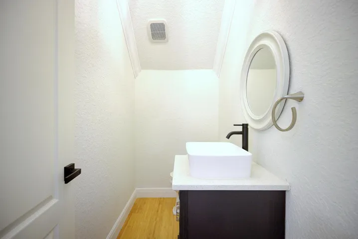 1/2 bath above garage