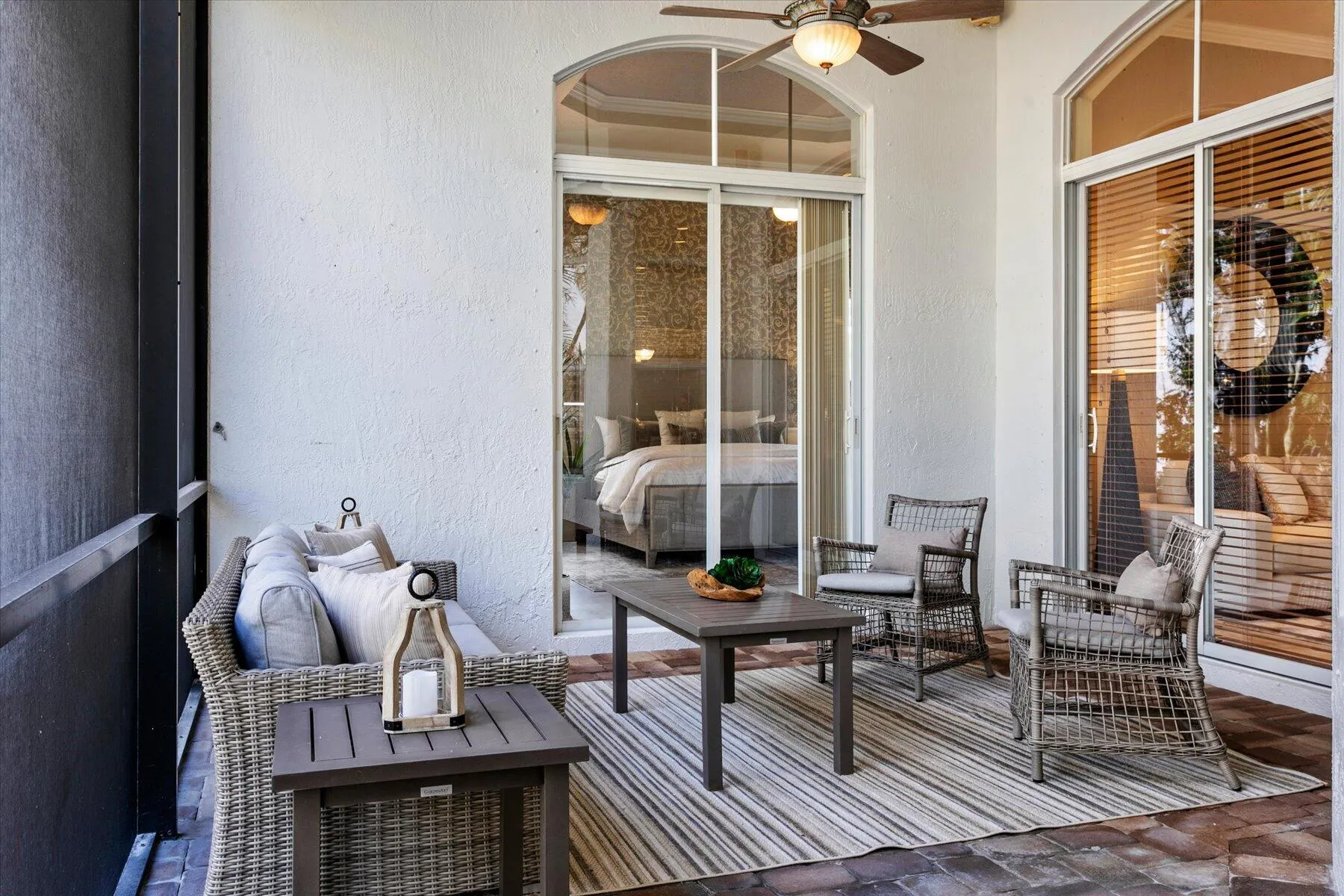 Screen Enclosed patio with access from family room, living area, and primary suite