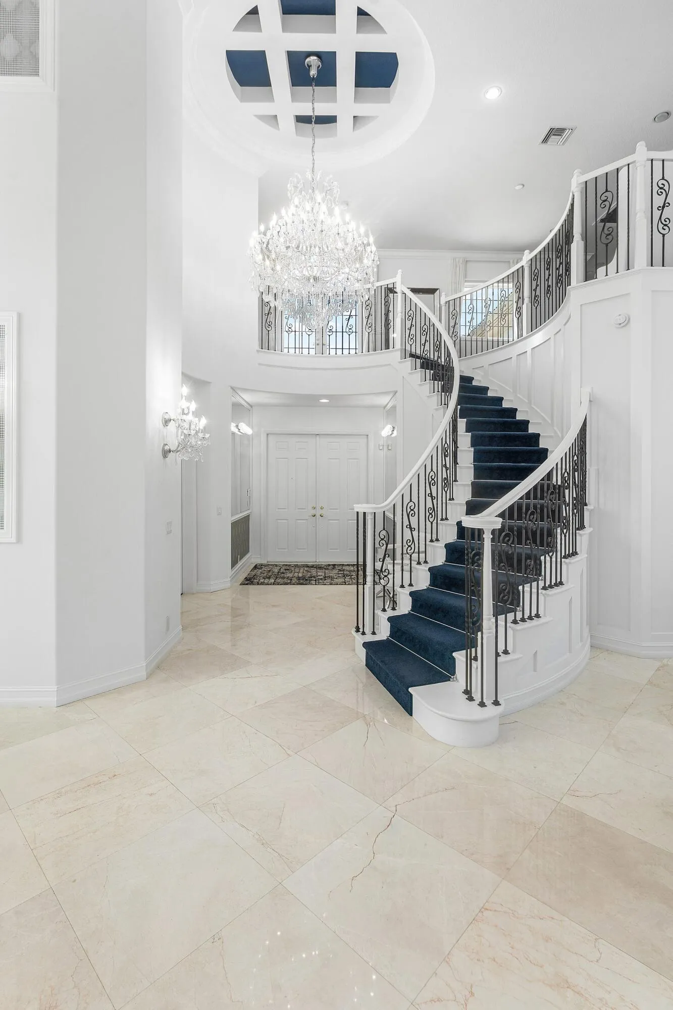 Double height entry brings tons of natural light +