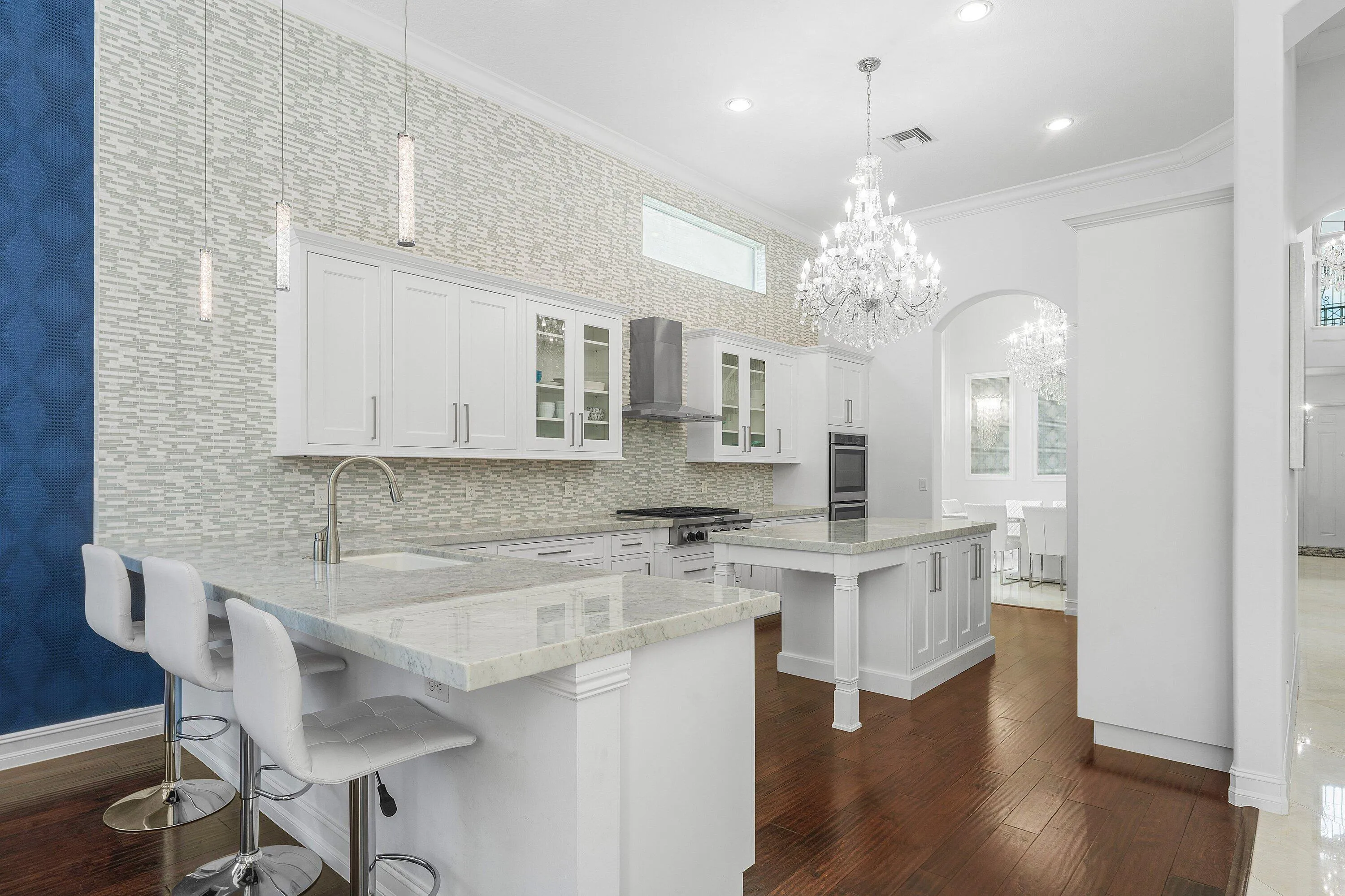 carrara marble counters, opens to family room