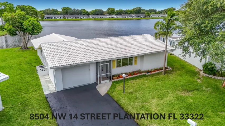 **WATERFRONT** 2 BEDROOM 2 BATH 1 CAR GARAGE** LAUDERDALE WEST COMMUNITY