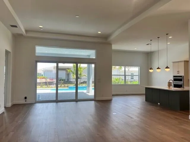 A luxurious open-concept great room and gourmet kitchen designed for entertaining