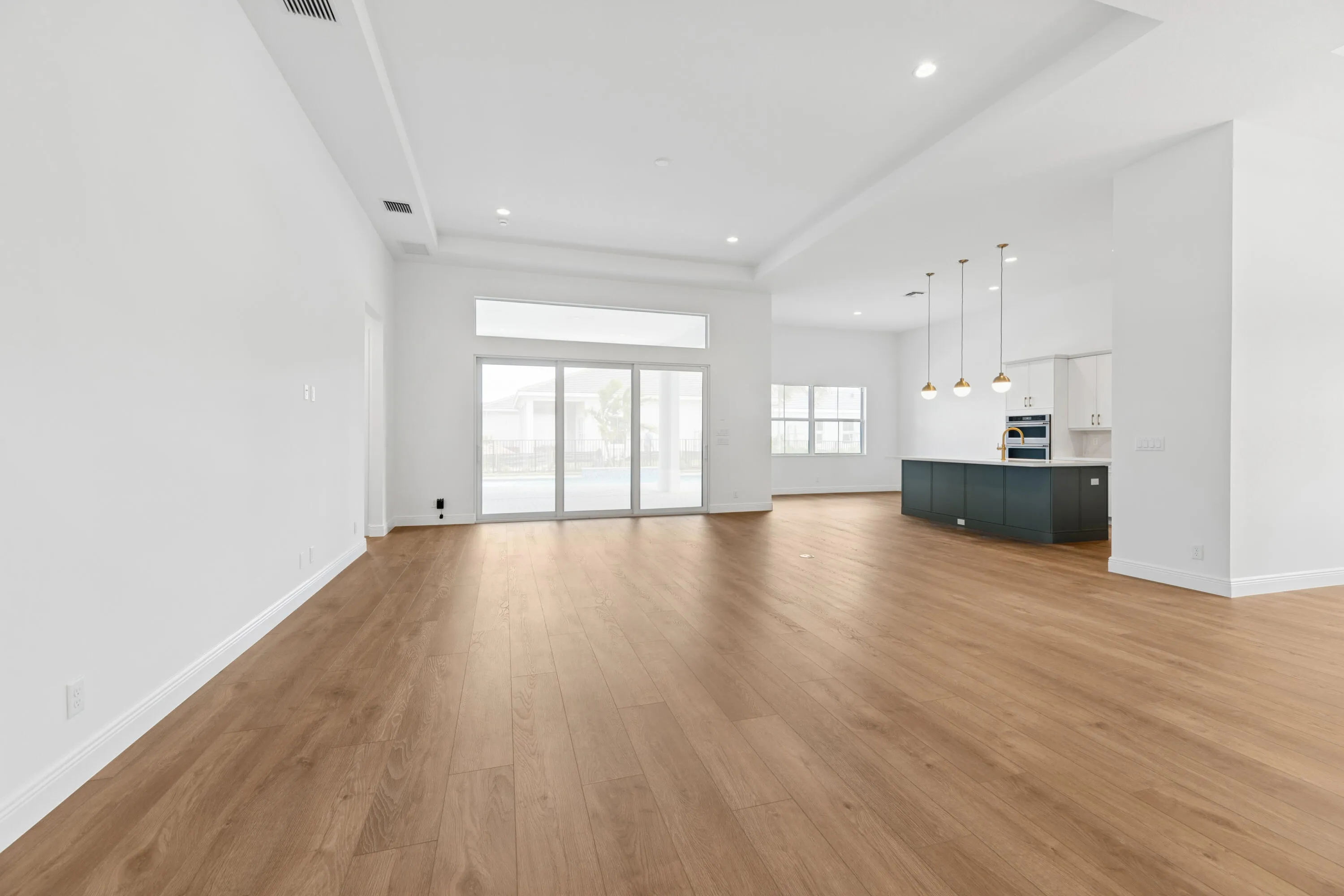 A spacious, open-concept great room with 12' ceilings