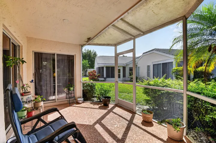 Relax and enjoy the covered and screen patio with view of the water