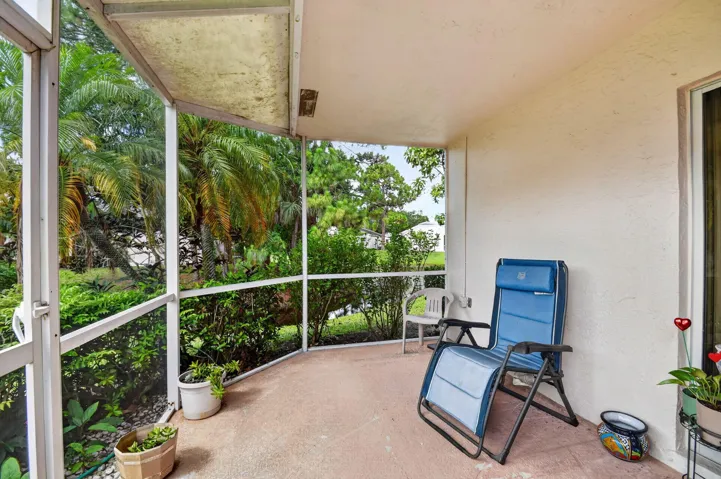 Relax and enjoy the covered and screen patio with view of the water