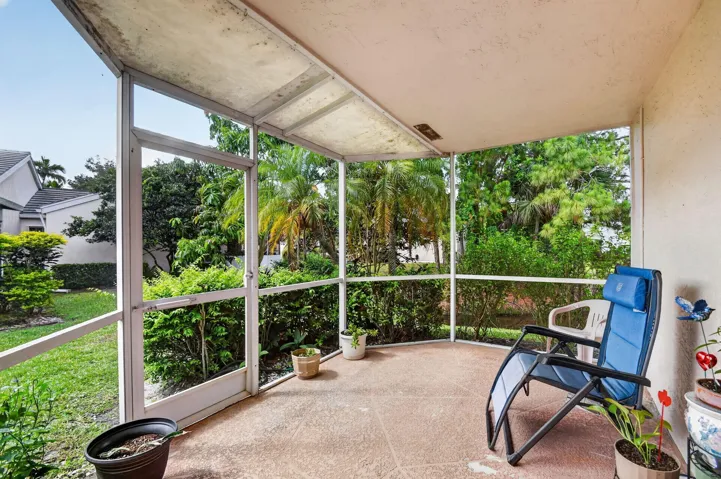 Relax and enjoy the covered and screen patio with view of the water
