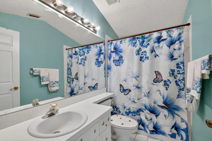 Second bathroom has a shower tub combo