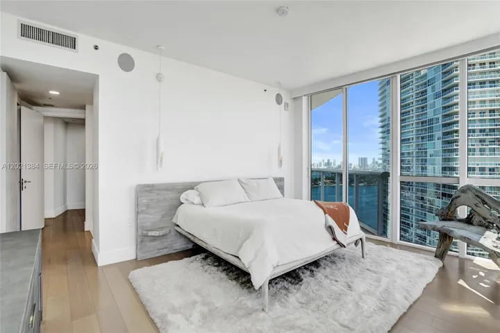 BRIGHT AND SPACIOUS MASTER BEDROOM WITH VIEWS IN EVERY DIRECTION!