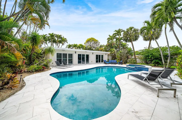 Do laps in your large private backyard, waterfront pool