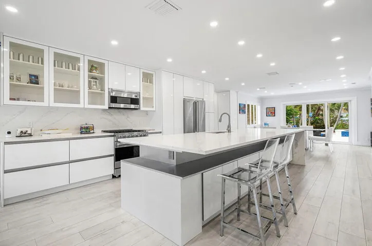 Enjoy your new kitchen with Viking gas stove and ample cabinets and oversized island