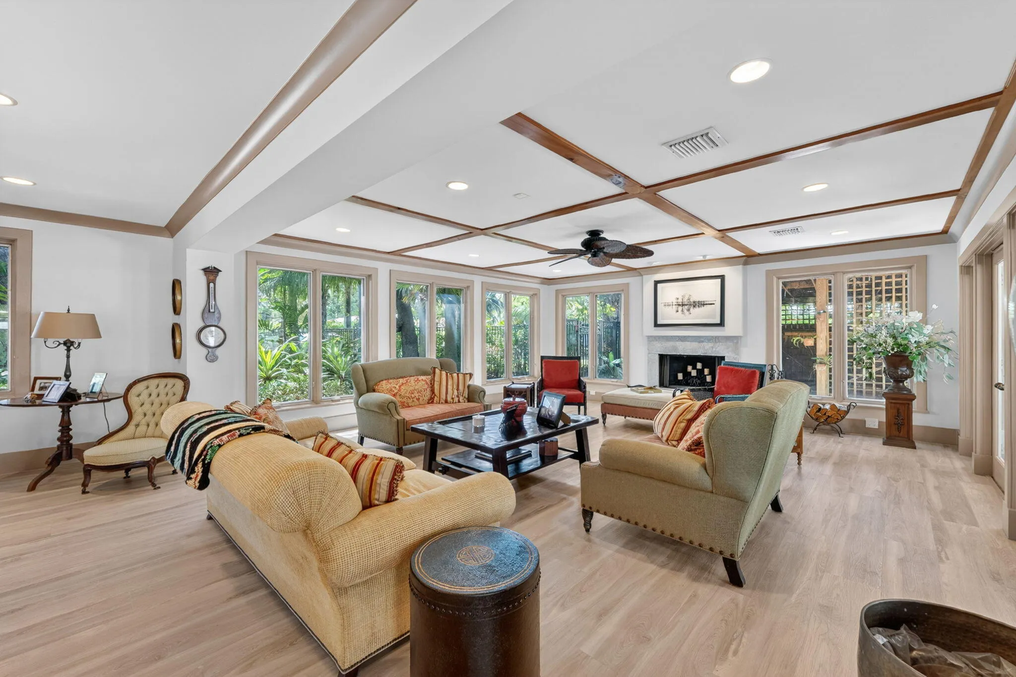 Spacious great room with an abundance of natural light throughout. Wood burning Fireplace