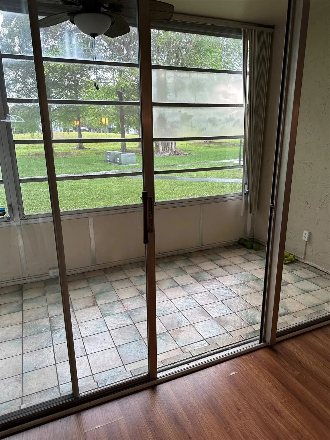 Screened patio with a nice garden view
