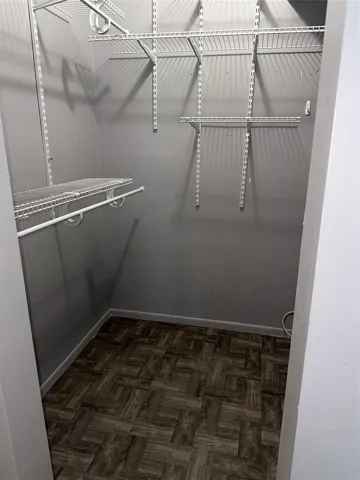 Master bedroom has a walk-in closet