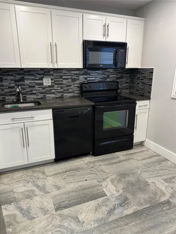 New kitchen with quartz countertops, and new applicances