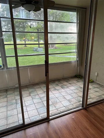 Screened patio with a nice garden view