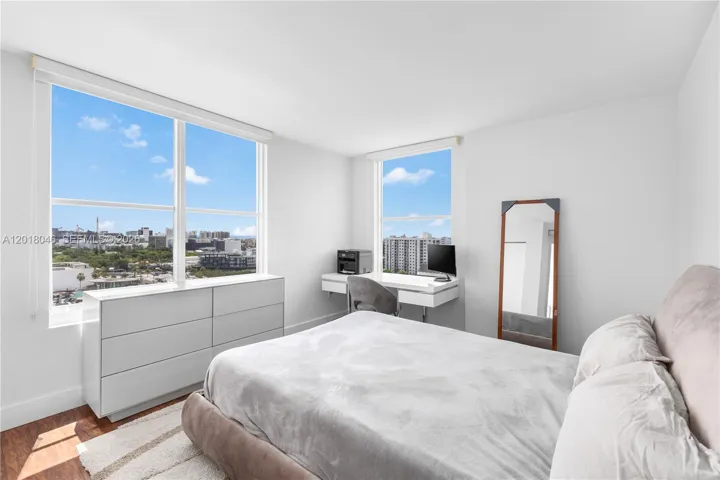 Guest Room has windows on 3 sides and balcony access