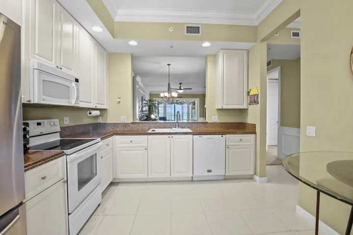 Kitchen with pass-through to dining area.
