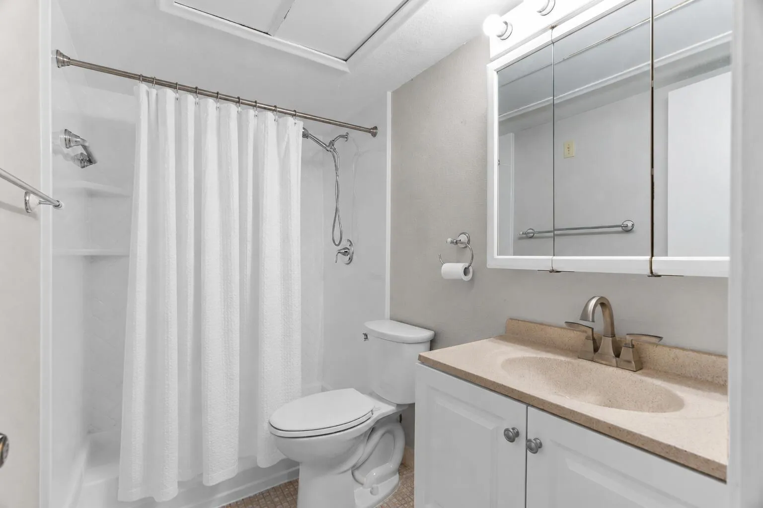 Guest Bathroom with Jacuzzi Shower and Updated Vanity