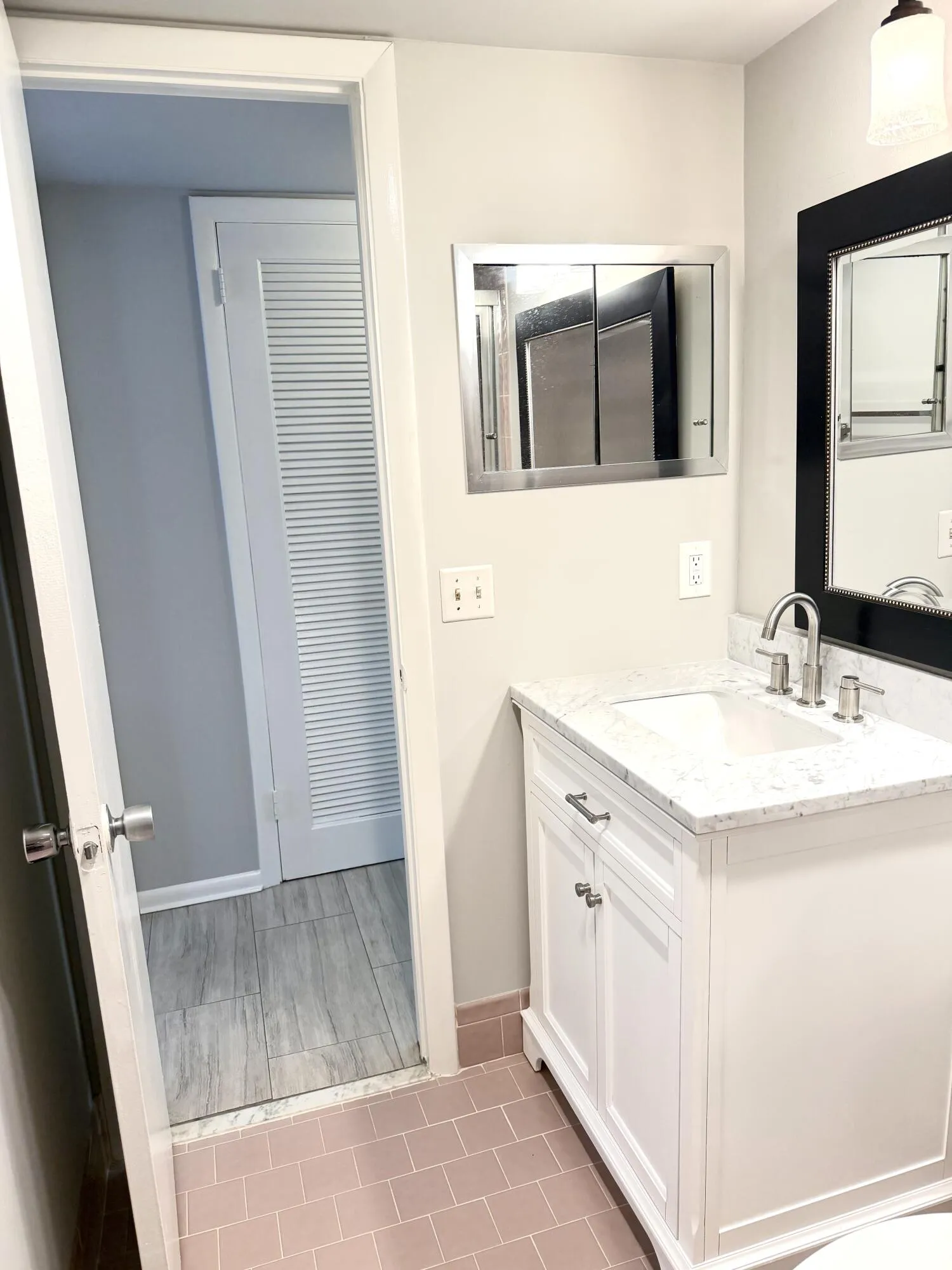 Medicine cabinet in bathroom.