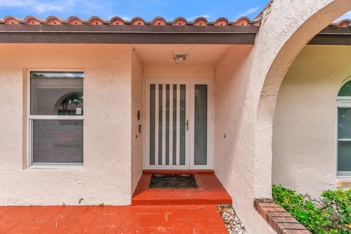 Front Entrance and Impact Glass Door
