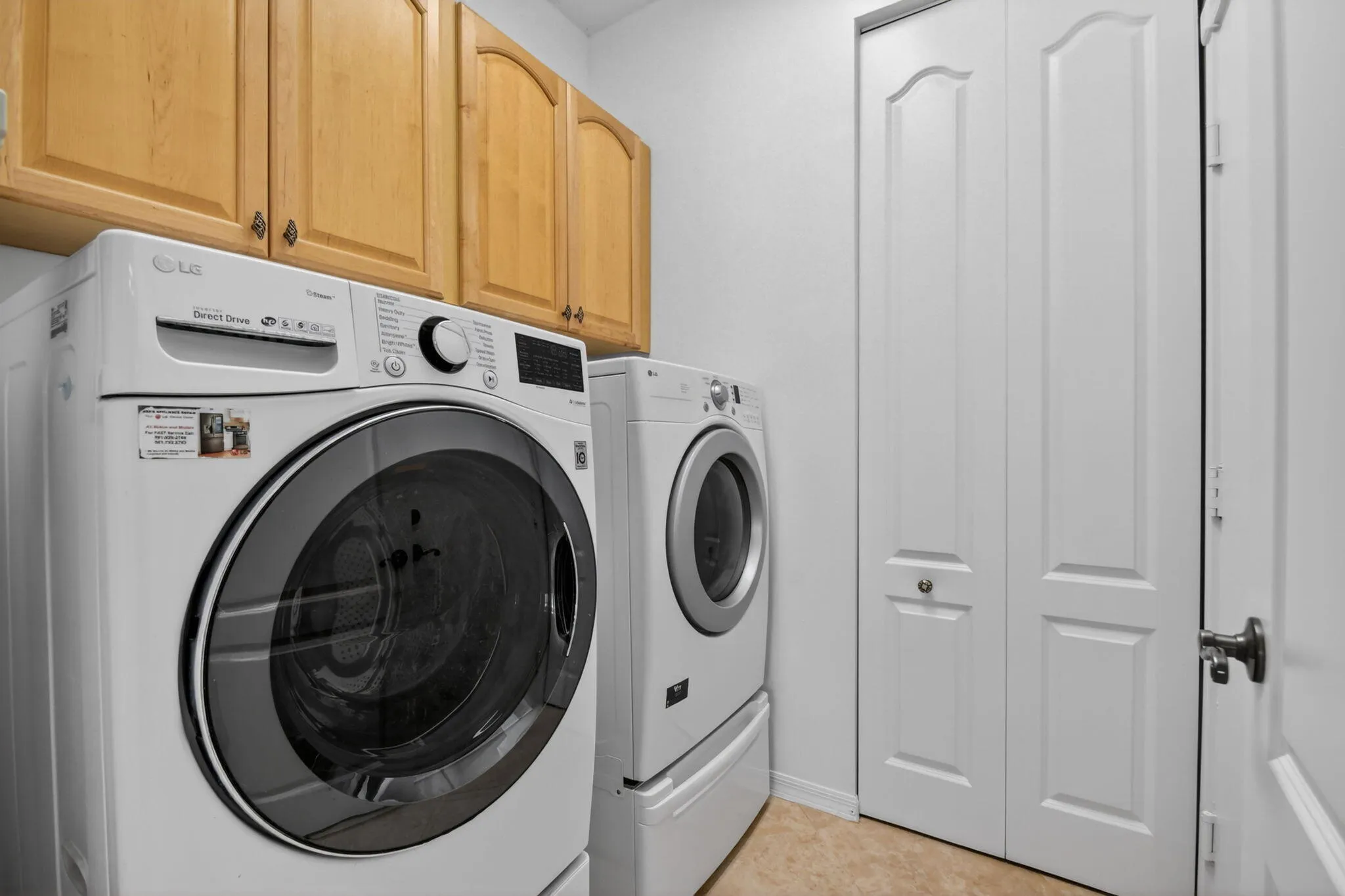 Laundry Room with Storage Cabinets