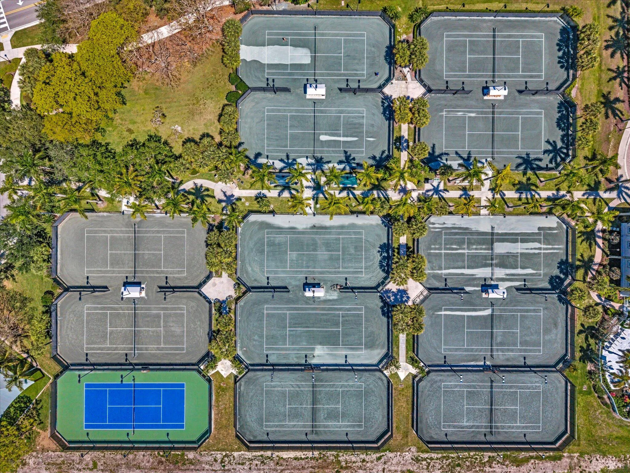 12 SENSATIONAL TENNIS COURTS AND AN ADDITIONAL POOL AND CLUBHOUSE