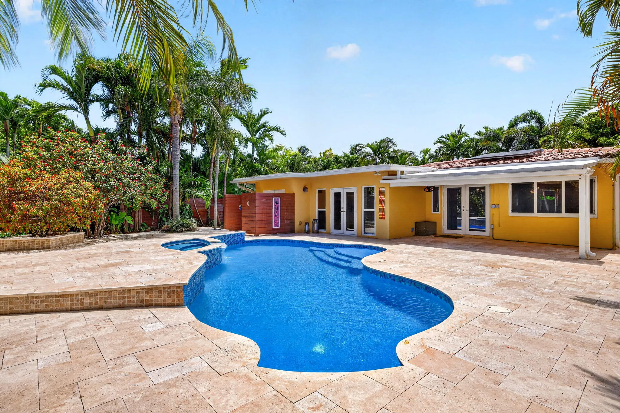 23 Covered Patio Overlooking Pool and Tr