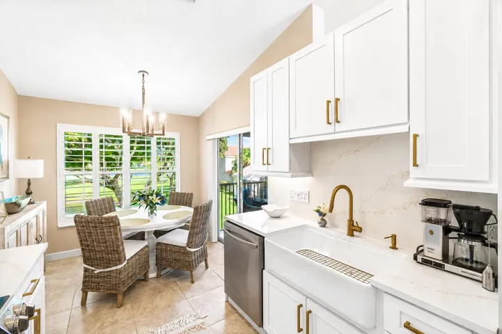Large farmhouse sink with brushed modern brass fixtures