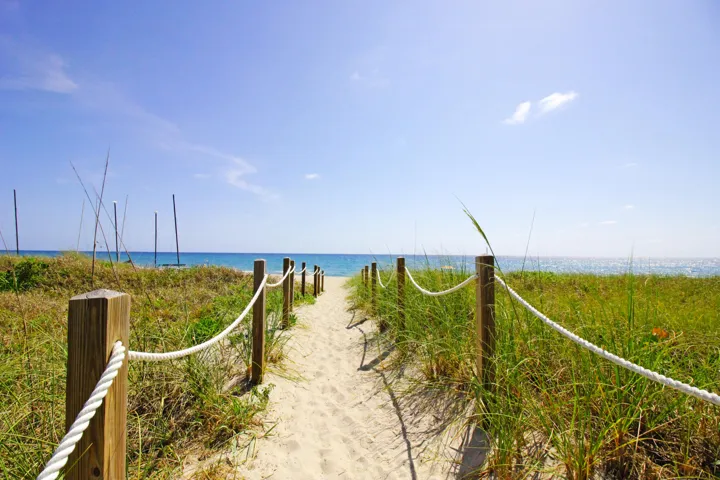 Enter the sand however you can