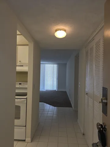HALLAWAY FACING LIVING ROOM